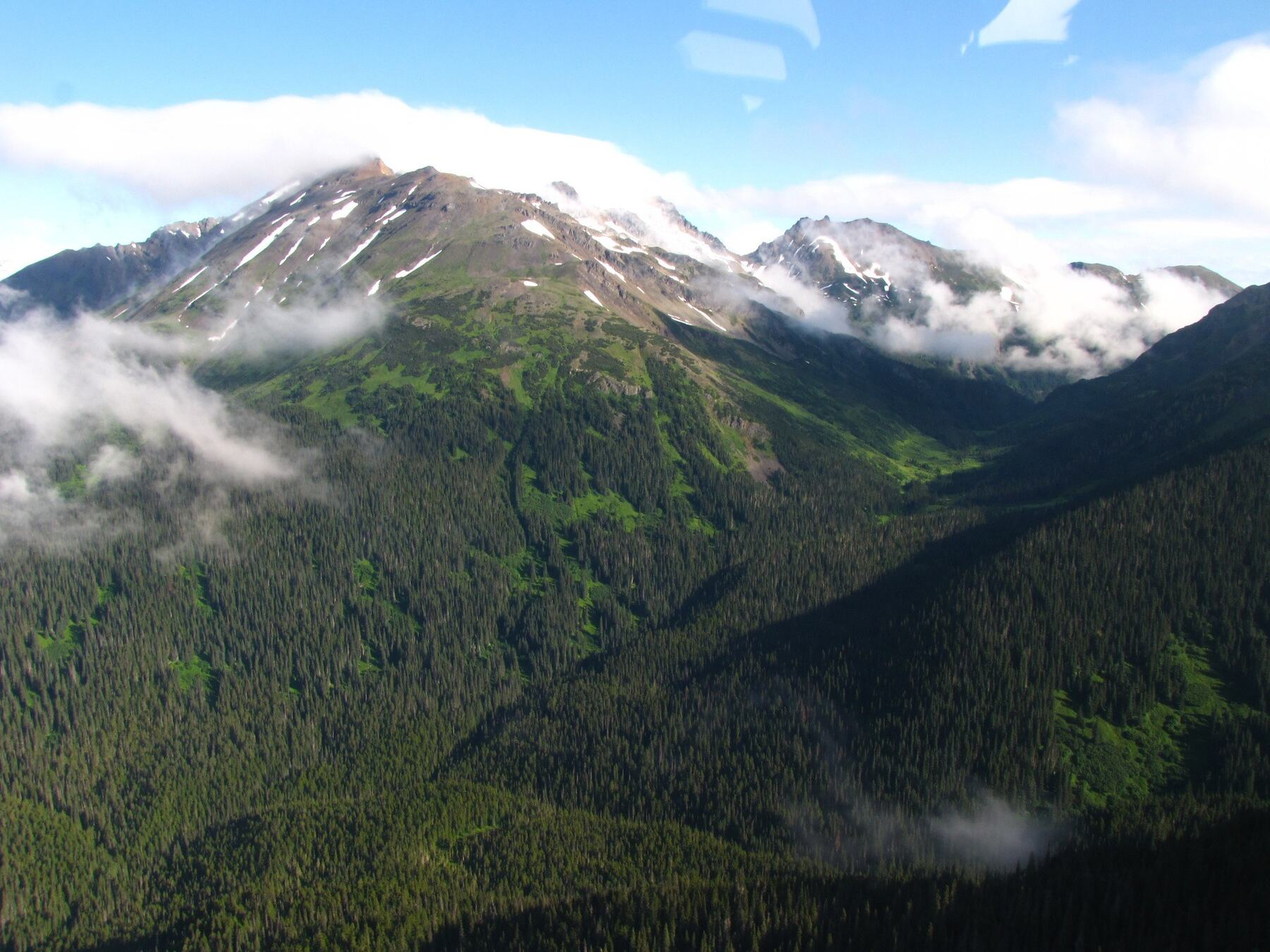 Aerial view of mountainous terrain at the Zymo property, west-central British Columbia